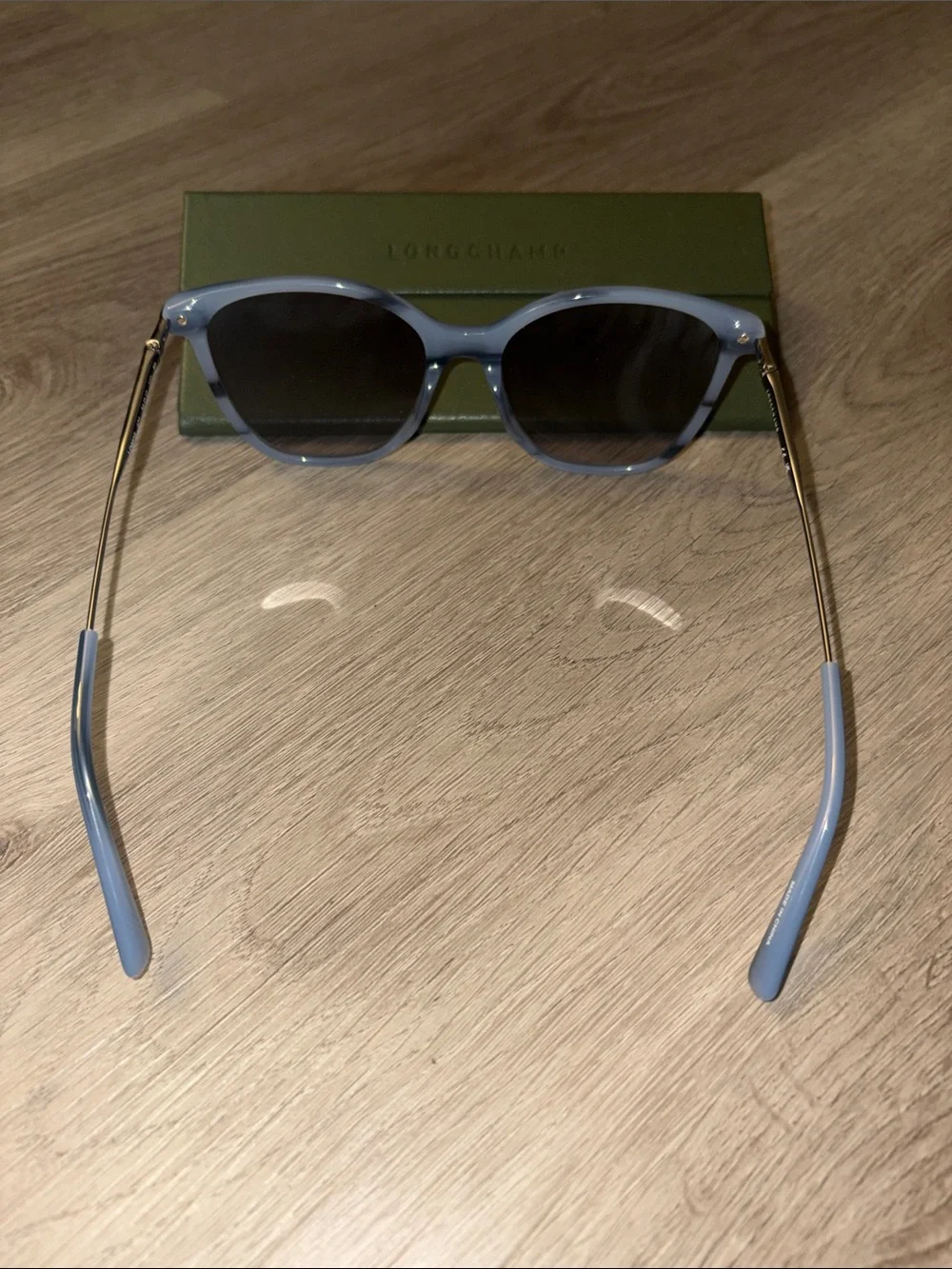 Longchamp Light Blue Frame Sunglasses with Gradient Lenses